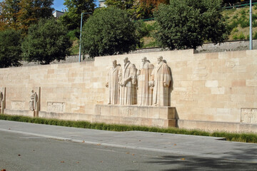 Reformation Wall in the Bastions Parc in Geneva, Switzerland. Monument statues of the calvinistes.