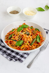 Spaghetti Pasta Pomodoro with Cheese, Italian Seasoning, Fresh Basil Vertical Photo