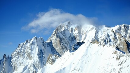 Fototapeta na wymiar Aerial view of the majestic Monte Bianco mountain range, featuring a stunning winter landscape