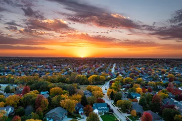 Poster Fall sunset aerial view over a neighborhood © Mark