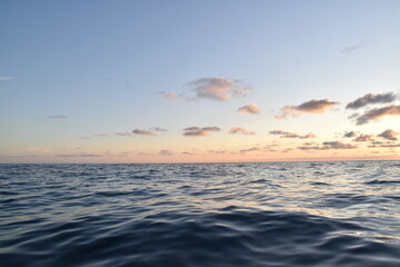 Fototapeta na wymiar Tranquil Seascape. Sunset over Ocean Horizon