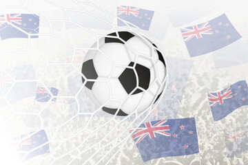 National Football team of New Zealand scored goal. Ball in goal net, while football supporters are waving the New Zealand flag in the background.