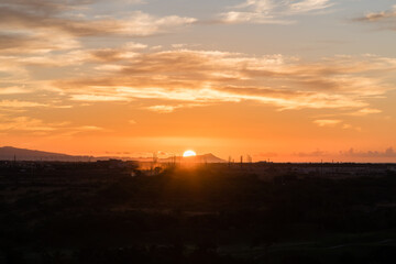 Sun rising over the Diamon Head mountain on Oahu, Hawaii