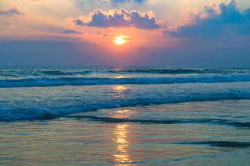 Tropical beach, blue sea and sunset.