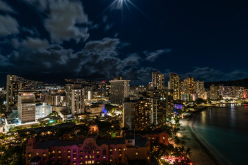 Fototapeta premium Scenic aerial panoramic night Waikiki Beach vista, Honolulu, Hawaii