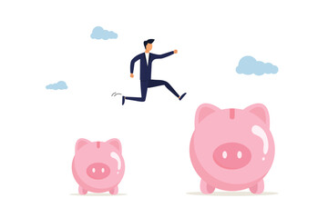 Increasing salary or profit, earning more money and accumulating more wealth, increasing investment and savings, business man jumping from a small piggy bank to a larger profit to achieve a financial 