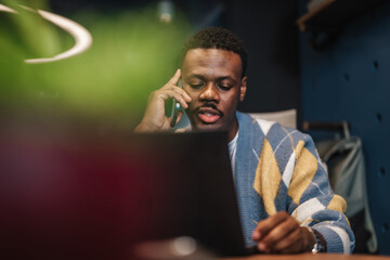 Confident employee gathers market research in modern downtown office. Experienced businessmen they analyze stock market news and statistics for growth and profit.