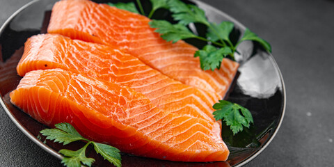 raw salmon fresh red fish seafood eating cooking meal food snack on the table copy space food background rustic top 