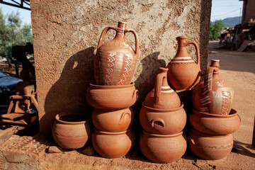 Rustic handmade brown terracotta vases and cups , Turkey