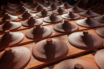 Rustic handmade brown terracotta vases and cups , Turkey