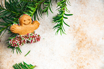 gingerbread man christmas cookie christmas sweet dessert holiday baking treat new year and celebration meal food snack on the table copy space food background