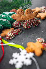 Obraz na płótnie Canvas gingerbread man christmas cookie christmas sweet dessert holiday baking treat new year and celebration meal food snack on the table copy space food background