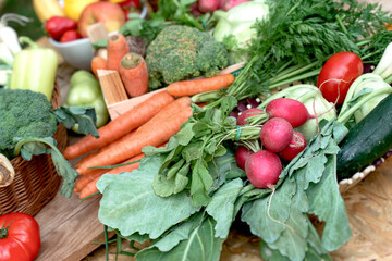 Vegetables on wooden table, heap of fresh organic vegetables, healthy vegetarian food  - 672399936