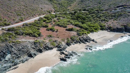 Photos from a drone of the Moreno Beach Margarita island and the angel rock momument.  Beach Landscape scenery and construction of houses in process