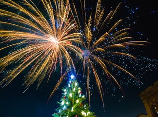 Christmas tree outside at night, with fireworks on the background