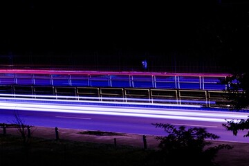 Long exposure shot of light trails on the highway road