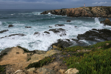 Fototapeta na wymiar Brave Atlantic Ocean on a stormy day in Porto Covo, Portugal