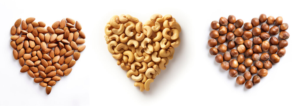 Heart shapes made of almonds, cashews and hazelnuts on white background