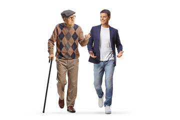 Elderly man with a cane walking and talking to a young man