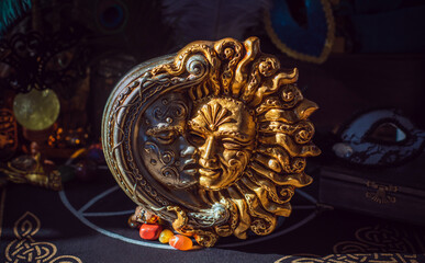 Mystical concept. Venice magical detail. Masks with sun and moon. Handmade decoration