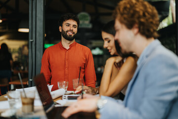Architects, engineers, and contractors meet outdoors at a coffee bar to discuss a blueprint. They collaborate on project details, showcasing their expertise in construction and urban planning.