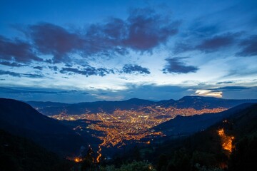 Fototapeta premium Aerial view of a city skyline at night, Medellin, Antioquia, Colombia