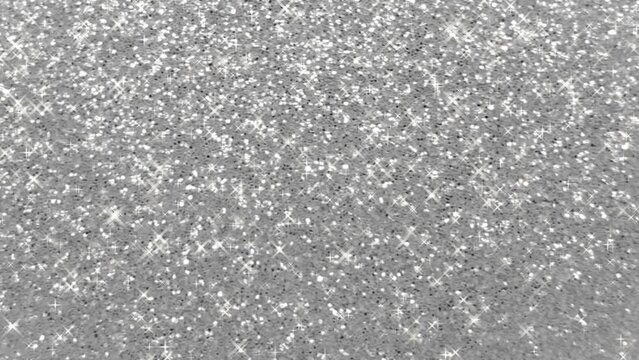 Looping animation of a sparkling silver glitter pattern background