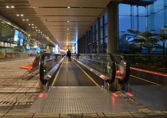 Empty airport with travelator to departure gate