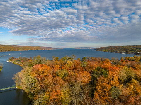 Fall, autumn, drone aerial image with view of Stewart Park at the south end of Cayuga Lake, Ithaca New York.	