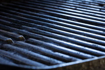 Background of cast iron barbecue grill grates