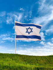 Flag of Israel in the wind against the background of the blue sky November 2, 2023 Tel Aviv 