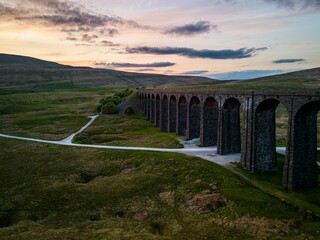 Aerial view of Ribblehead Viaduct in England at sunset