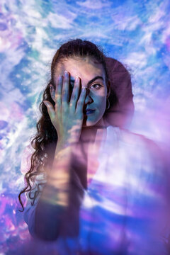 Woman in quest for inner clarity in a cosmic introspective stance