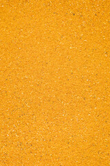 Fototapeta premium turmeric powder textured background, close up