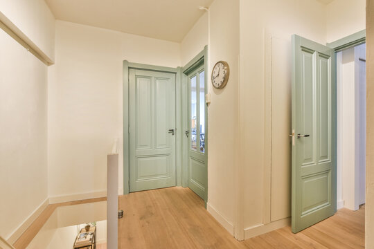 Empty corridor with green doors at home