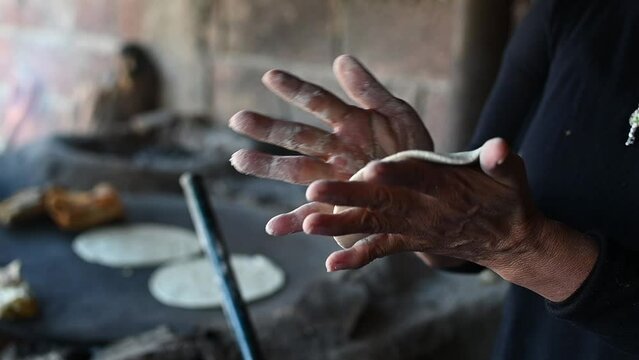 Preparation of corn tortillas in a traditional Mexican way