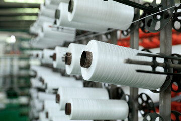 Packaging bag production workshop, A factory workshop where textile belts are produced - obrazy, fototapety, plakaty