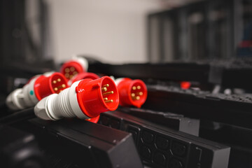 Rails with IEC 60320 C13 and IEC 60320 C19 sockets and industrial 32A 5PIN plug connectors (IEC 60309, IEC 309 or CEE 17). - obrazy, fototapety, plakaty