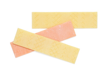 Sticks of tasty bubble gums isolated on white, top view