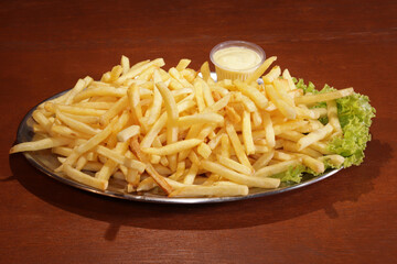 Portion of French Fries with Sauce