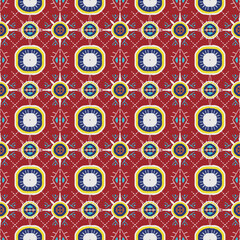 Beautiful ethnic tribal fabric pattern red background, yellow, white, and blue pattern.