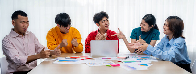Excited and happy startup company employee celebrate after make successful strategic business...