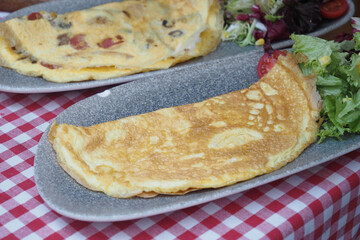 Plain Egg Omelette on breakfast table 
