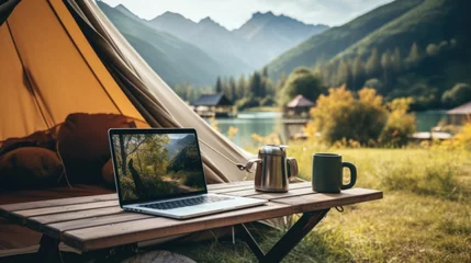 Foto auf Acrylglas Camping outdoor desktop business office beside camping tent on summer holiday. 