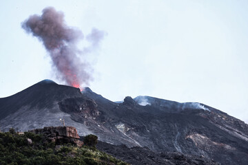 An eruption with lava fountain of the active Volcano Stromboli located on the island of Stromboli, which is one of the seven Aeolian Islands in the northern part of Sicily, Italy