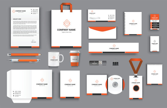 office business stationary set in orange black white color vector design with letter head envelop folder id card notepad dvd cover usb paper clip pen pencil cups business card shopper