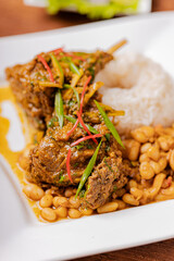 Cabrito a la norteña is a dry dish typical of Peruvian gastronomy.
