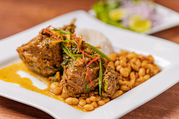 Cabrito a la norteña is a dry dish typical of Peruvian gastronomy.
