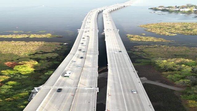 Aerial View of 520 Bridge Spanning Over Land and Water in Washington, Vertical Shot