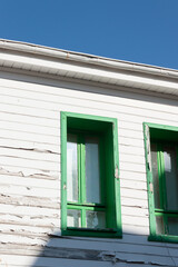 Wooden window with grille of wooden house